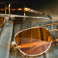 Incline Sunglasses: Polished Gold Frame Amber Lens