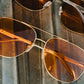 Incline Sunglasses: Polished Gold Frame Amber Lens