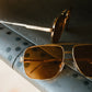 Nimitz Sunglasses: Polished Gold Frame Amber Lens