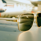 Nimitz Sunglasses: Gold Frame Black Lens