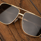 Nimitz Sunglasses: Gold Frame Black Lens